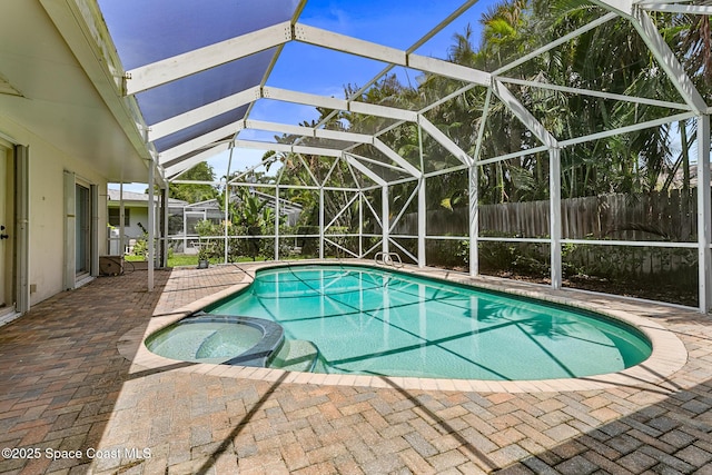 320 Cocoa Ave, Indialantic, FL 32903 - view of pool featuring a patio area, a pool with connected hot tub, and a lanai