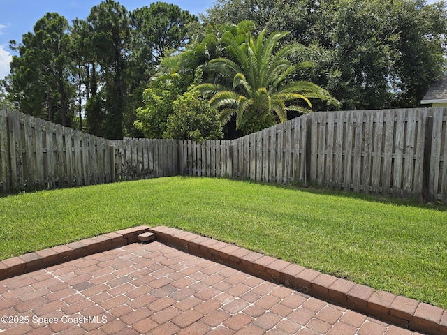 1150 Ida Way, Melbourne, FL 32940 - fenced backyard featuring a patio