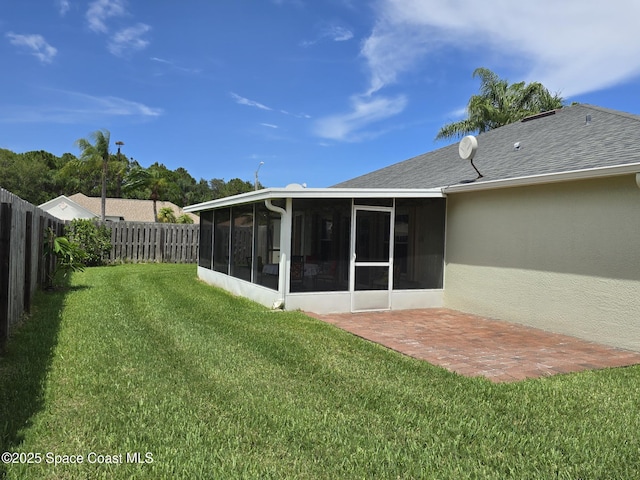 1150 Ida Way, Melbourne, FL 32940 - fenced backyard with a sunroom