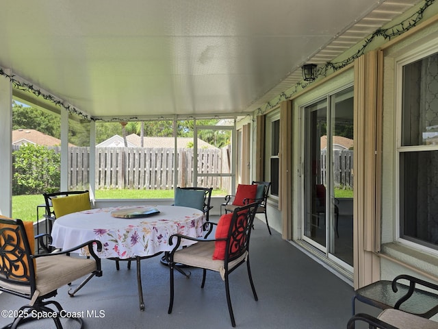 1150 Ida Way, Melbourne, FL 32940 - sunroom featuring outdoor dining area