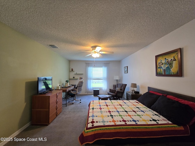 1150 Ida Way, Melbourne, FL 32940 - bedroom with carpet, a desk, a textured ceiling, and a ceiling fan