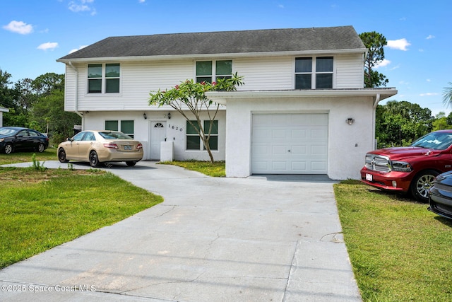 1620 Wichita Blvd SE, Palm Bay, FL 32909 - view of front facade with a garage, a front lawn, driveway, and stucco siding