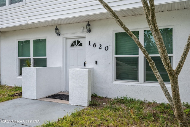 1620 Wichita Blvd SE, Palm Bay, FL 32909 - view of exterior entry with stucco siding