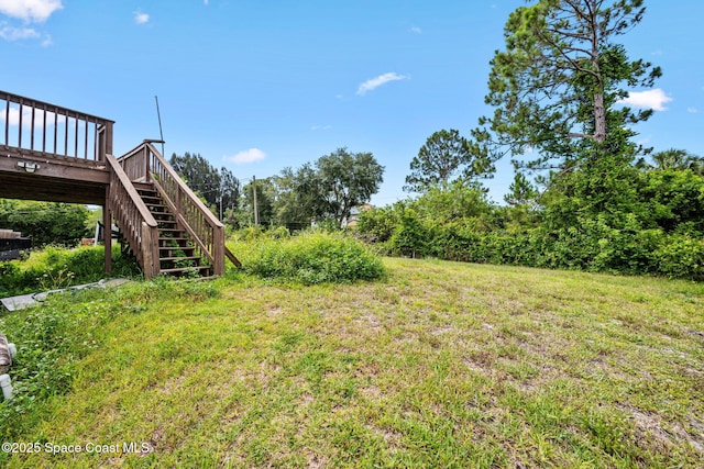 1620 Wichita Blvd SE, Palm Bay, FL 32909 - view of yard featuring stairs and a deck