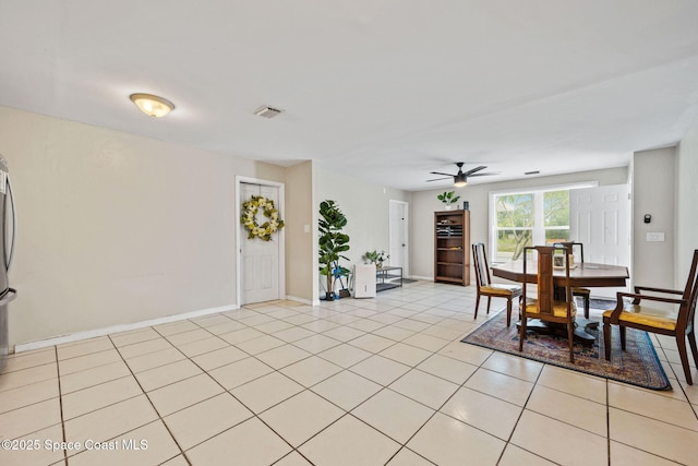1620 Wichita Blvd SE, Palm Bay, FL 32909 - dining space with a ceiling fan, baseboards, and light tile patterned floors