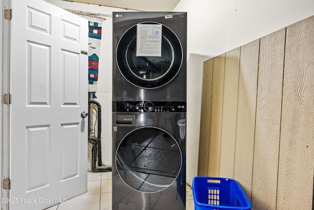 1620 Wichita Blvd SE, Palm Bay, FL 32909 - laundry room with stacked washer / dryer and tile patterned floors