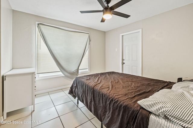 1620 Wichita Blvd SE, Palm Bay, FL 32909 - bedroom with light tile patterned floors, a ceiling fan, and baseboards
