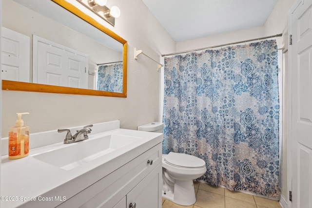1620 Wichita Blvd SE, Palm Bay, FL 32909 - full bath with tile patterned floors, vanity, toilet, and a shower with curtain