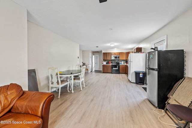 1620 Wichita Blvd SE, Palm Bay, FL 32909 - living area with light wood-style floors