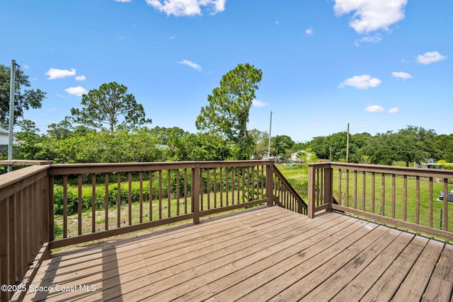 1620 Wichita Blvd SE, Palm Bay, FL 32909 - wooden terrace with view of scattered trees