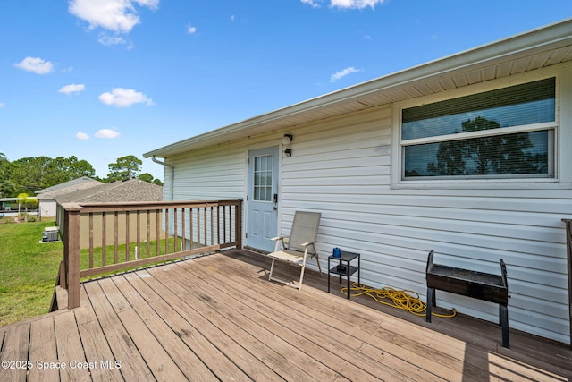 1620 Wichita Blvd SE, Palm Bay, FL 32909 - wooden terrace featuring a yard