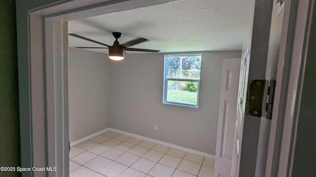 1620 Wichita Blvd SE, Palm Bay, FL 32909 - empty room featuring ceiling fan, light tile patterned flooring, and baseboards