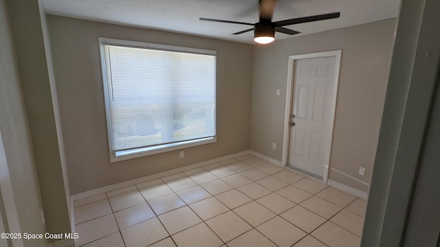 1620 Wichita Blvd SE, Palm Bay, FL 32909 - spare room with light tile patterned flooring, a ceiling fan, and baseboards