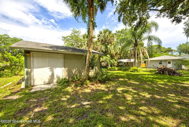 5320 Shadwell Ave, Cocoa, FL 32926 - view of green lawn featuring a shed
