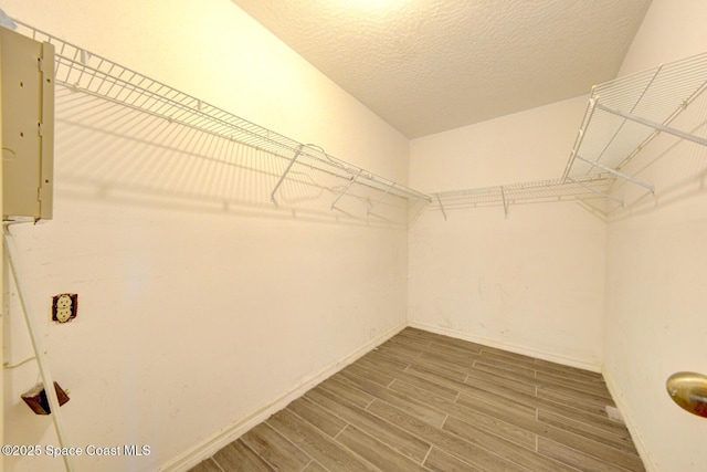 5320 Shadwell Ave, Cocoa, FL 32926 - spacious closet with wood finished floors