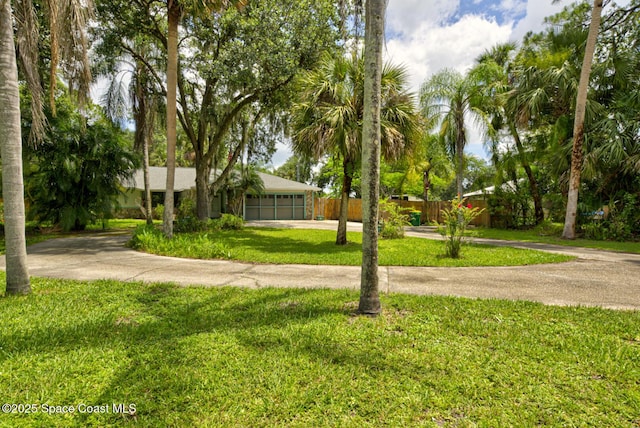 5320 Shadwell Ave, Cocoa, FL 32926 - view of front of house with driveway and a garage