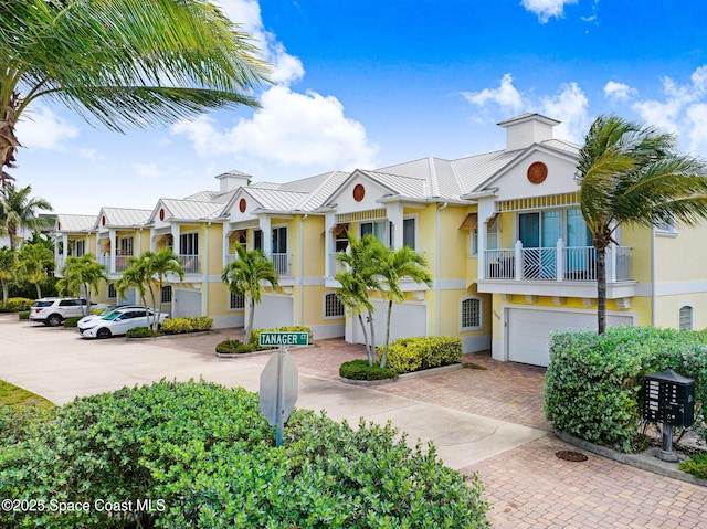 2178 Tanager Ct, Melbourne, FL 32903 - view of property featuring decorative driveway and an attached garage
