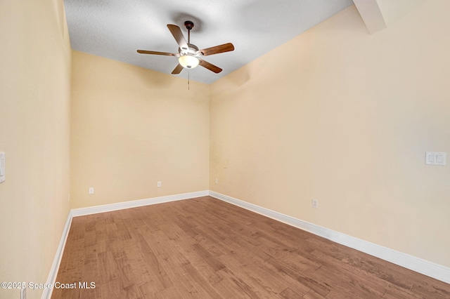 2178 Tanager Ct, Melbourne, FL 32903 - empty room featuring ceiling fan, wood finished floors, and baseboards