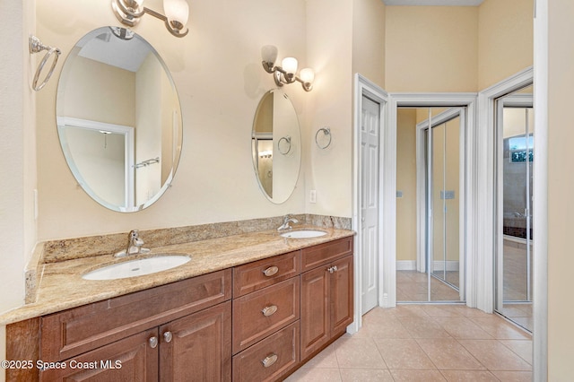 2178 Tanager Ct, Melbourne, FL 32903 - full bathroom featuring double vanity and tile patterned floors