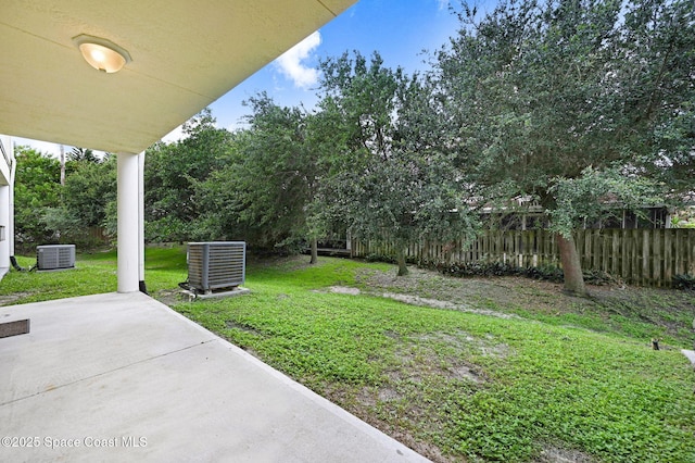 2178 Tanager Ct, Melbourne, FL 32903 - view of yard featuring cooling unit and a patio