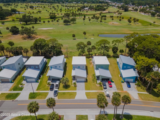 2148 Country Club Rd, Melbourne, FL 32901 - aerial perspective of suburban area with a local golf course and a nearby body of water