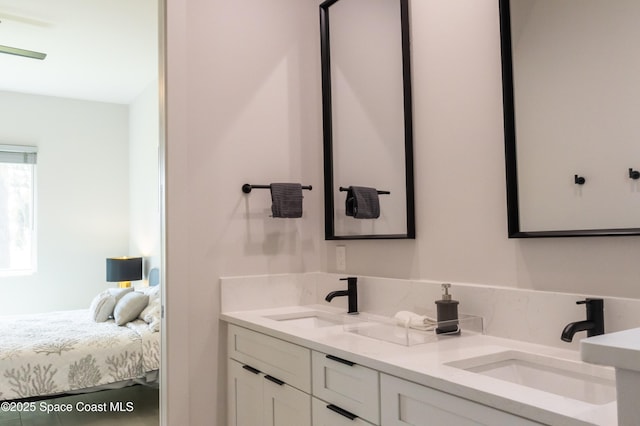 2148 Country Club Rd, Melbourne, FL 32901 - bathroom featuring double vanity and connected bathroom