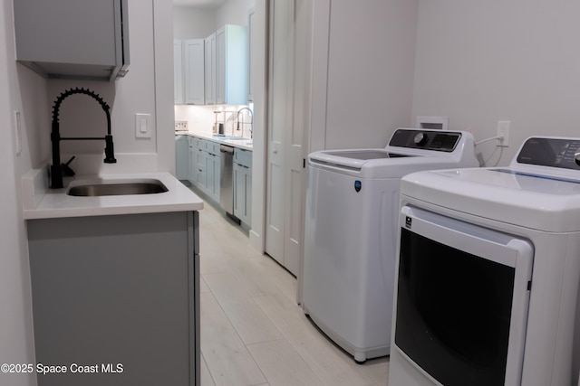 2148 Country Club Rd, Melbourne, FL 32901 - laundry room featuring washing machine and dryer and cabinet space