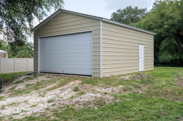 4180 Seville Ave, Cocoa, FL 32926 - detached garage featuring driveway