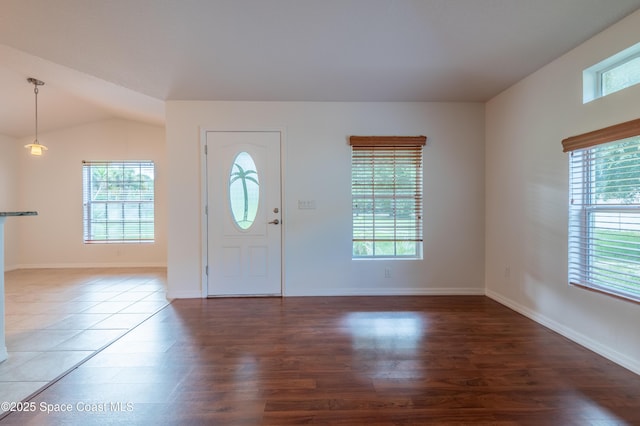4180 Seville Ave, Cocoa, FL 32926 - entrance foyer featuring wood finished floors and vaulted ceiling