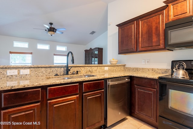 4180 Seville Ave, Cocoa, FL 32926 - kitchen featuring black appliances, lofted ceiling, light stone countertops, a ceiling fan, and light tile patterned floors
