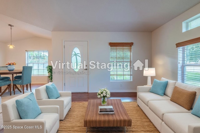 4180 Seville Ave, Cocoa, FL 32926 - living room with wood finished floors and vaulted ceiling