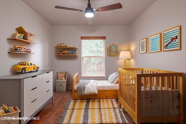 4180 Seville Ave, Cocoa, FL 32926 - bedroom with wood finished floors and ceiling fan