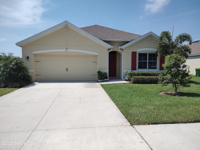 565 Sorrento Dr, Cocoa, FL 32922 - ranch-style house featuring concrete driveway, a front lawn, stucco siding, and a garage