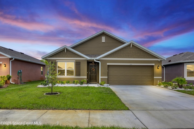 1265 Valley View Ave, Rockledge, FL 32955 - view of front of property with an attached garage, driveway, a front lawn, and stucco siding