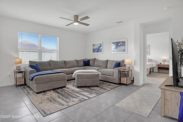 1265 Valley View Ave, Rockledge, FL 32955 - living area with ceiling fan and light tile patterned floors