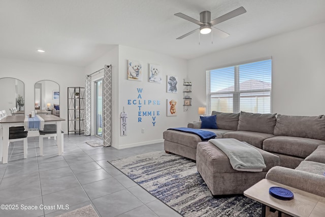 1265 Valley View Ave, Rockledge, FL 32955 - living area with a ceiling fan, light tile patterned floors, arched walkways, and recessed lighting