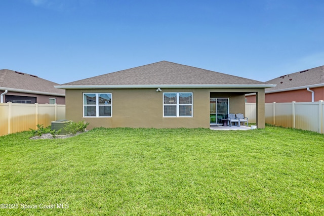 1265 Valley View Ave, Rockledge, FL 32955 - back of house with stucco siding, a fenced backyard, a patio area, and roof with shingles