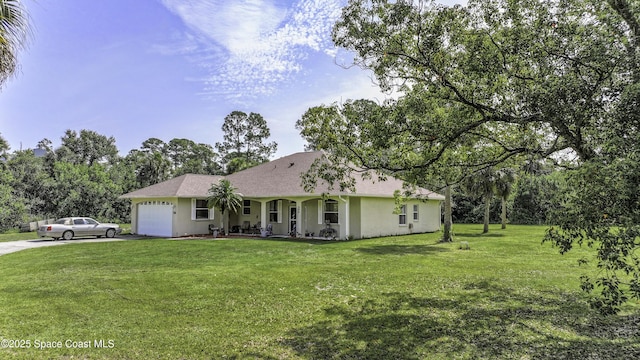 386 Valencia Rd, Melbourne, FL 32904 - ranch-style home featuring an attached garage, a porch, a front yard, concrete driveway, and stucco siding