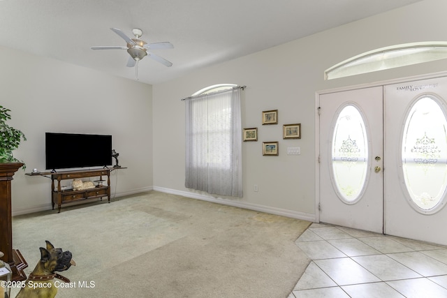 386 Valencia Rd, Melbourne, FL 32904 - carpeted foyer entrance featuring ceiling fan and washer / dryer
