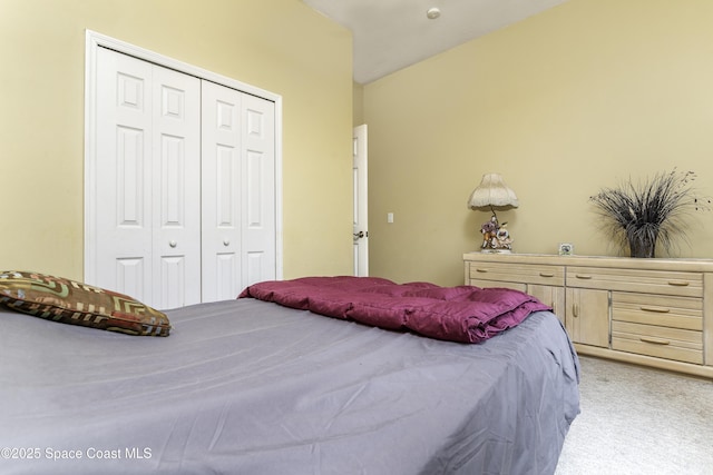 386 Valencia Rd, Melbourne, FL 32904 - bedroom featuring light colored carpet and a closet