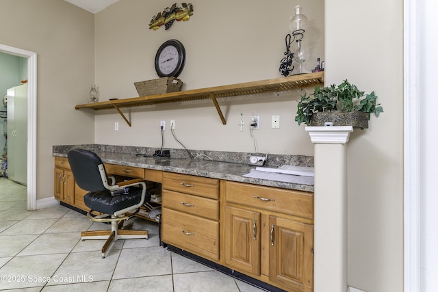 386 Valencia Rd, Melbourne, FL 32904 - office featuring light tile patterned flooring and built in study area