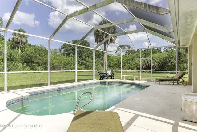 386 Valencia Rd, Melbourne, FL 32904 - outdoor pool with a yard, a patio, glass enclosure, and view of scattered trees