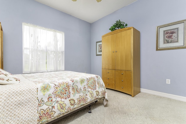 386 Valencia Rd, Melbourne, FL 32904 - carpeted bedroom featuring baseboards and ceiling fan