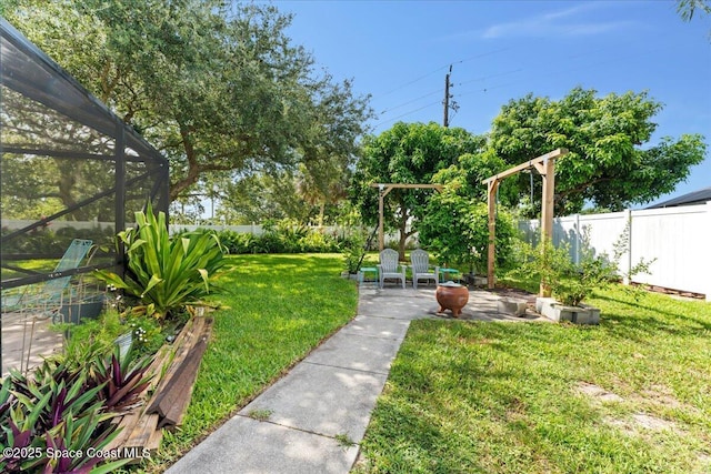 1211 Olde Bailey Ln, Melbourne, FL 32904 - fenced backyard with a patio