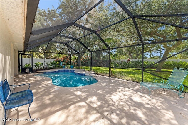 1211 Olde Bailey Ln, Melbourne, FL 32904 - view of pool featuring a patio, glass enclosure, and a fenced backyard