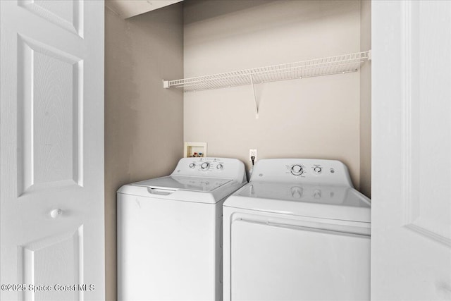 1211 Olde Bailey Ln, Melbourne, FL 32904 - laundry area featuring independent washer and dryer