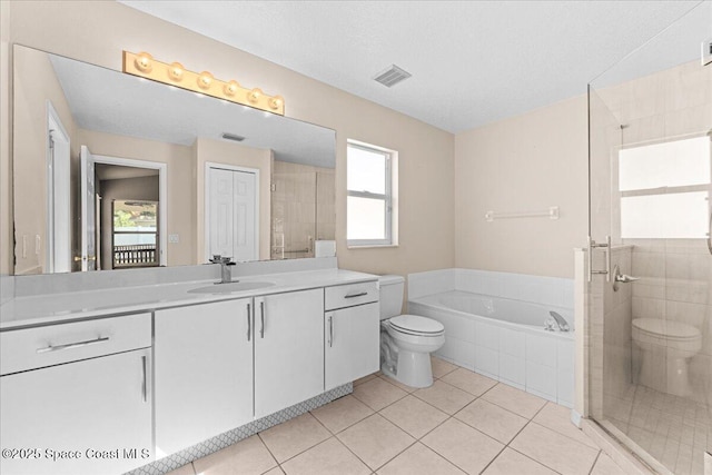 1211 Olde Bailey Ln, Melbourne, FL 32904 - bathroom with a bath, vanity, a shower stall, and tile patterned floors