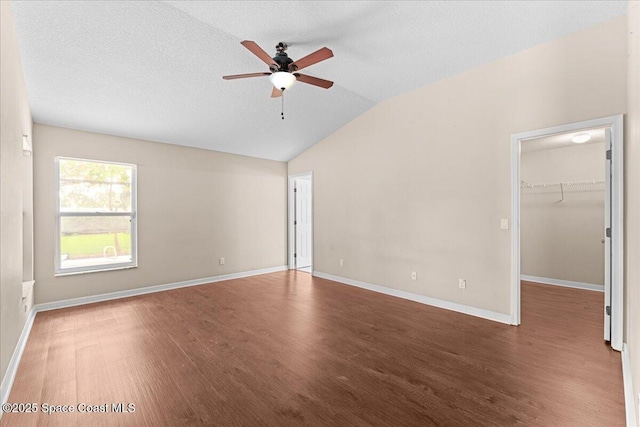 1211 Olde Bailey Ln, Melbourne, FL 32904 - unfurnished room featuring ceiling fan, wood finished floors, vaulted ceiling, and a textured ceiling