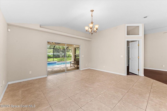 1211 Olde Bailey Ln, Melbourne, FL 32904 - unfurnished room featuring vaulted ceiling, a chandelier, and light tile patterned floors