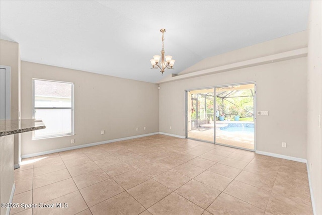 1211 Olde Bailey Ln, Melbourne, FL 32904 - unfurnished room with a chandelier, light tile patterned flooring, and lofted ceiling